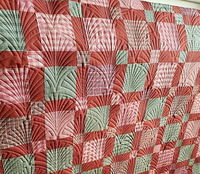 Janet: This is a charity quilt I picked up at the last guild meeting to long arm quilt. Piecer unknown. It was sent on to Sally Z for binding. 