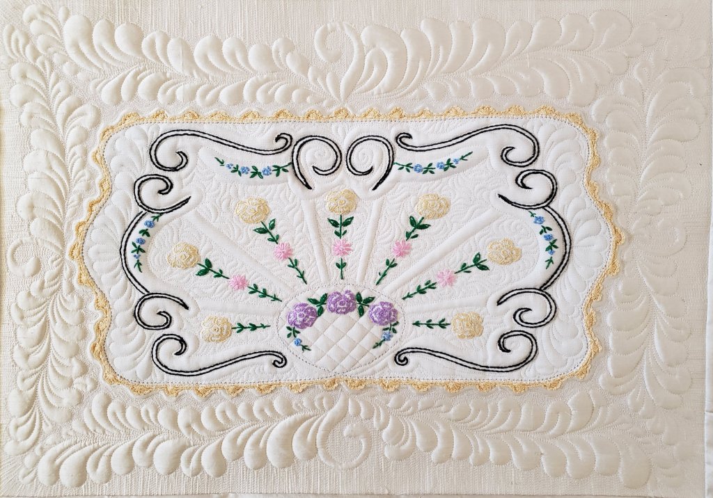 Janet H: Fun quilting up a vintage linen on silk.