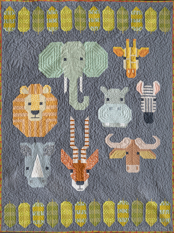 Barb P: This first quilt is for my granddaughter and is twin size.  I call it "Out of Africa" because of the safari animals.  quilted by Char Koppenol of Allendale.